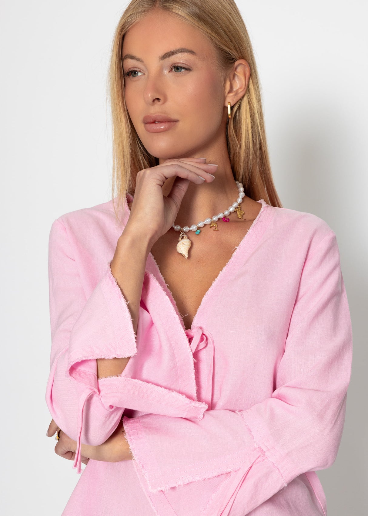 Leinen Bluse mit Trompetenärmel und Schleifenverschluss - pink