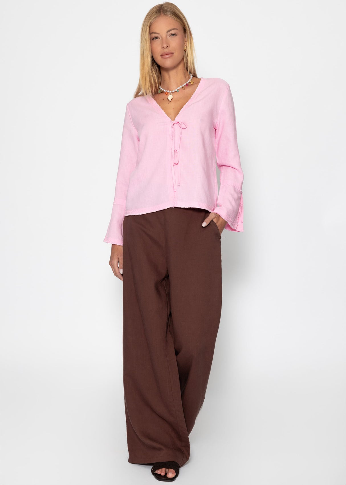 Leinen Bluse mit Trompetenärmel und Schleifenverschluss - pink