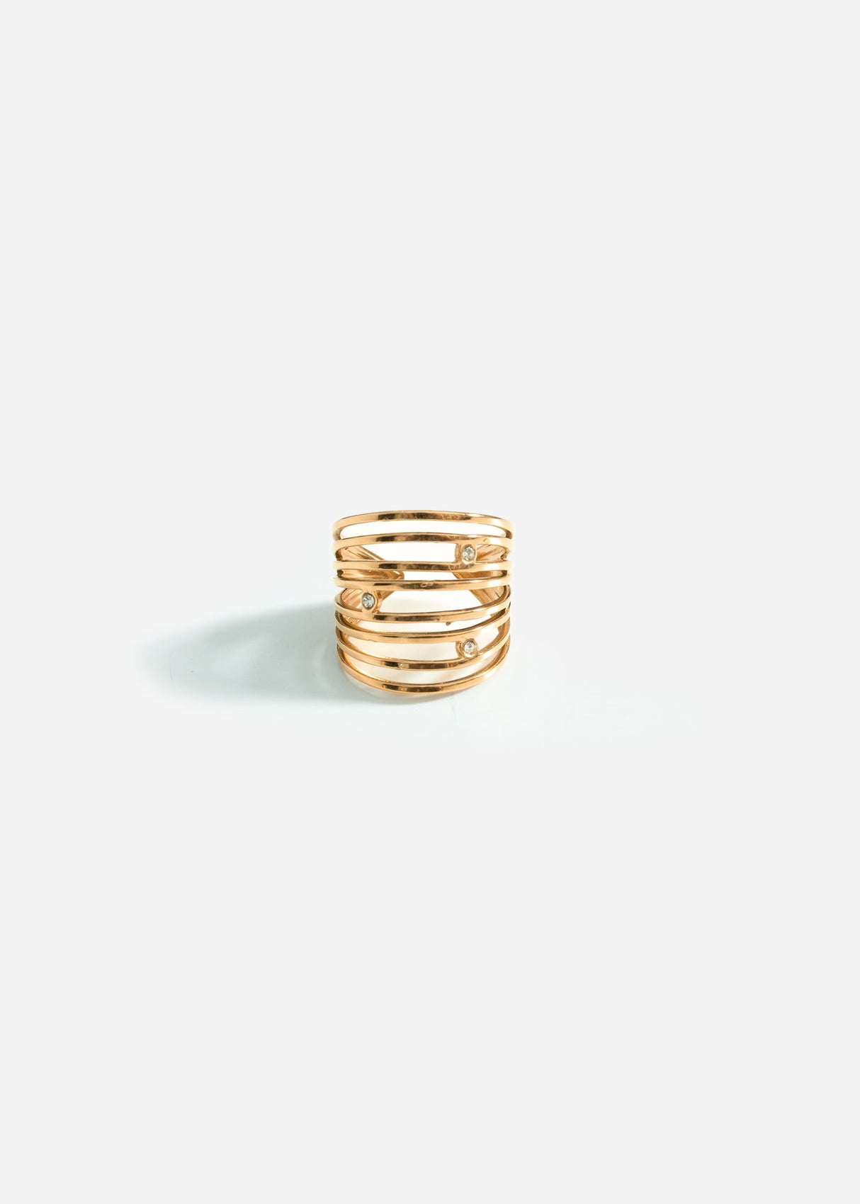 Multi-row ring with offset stones - gold