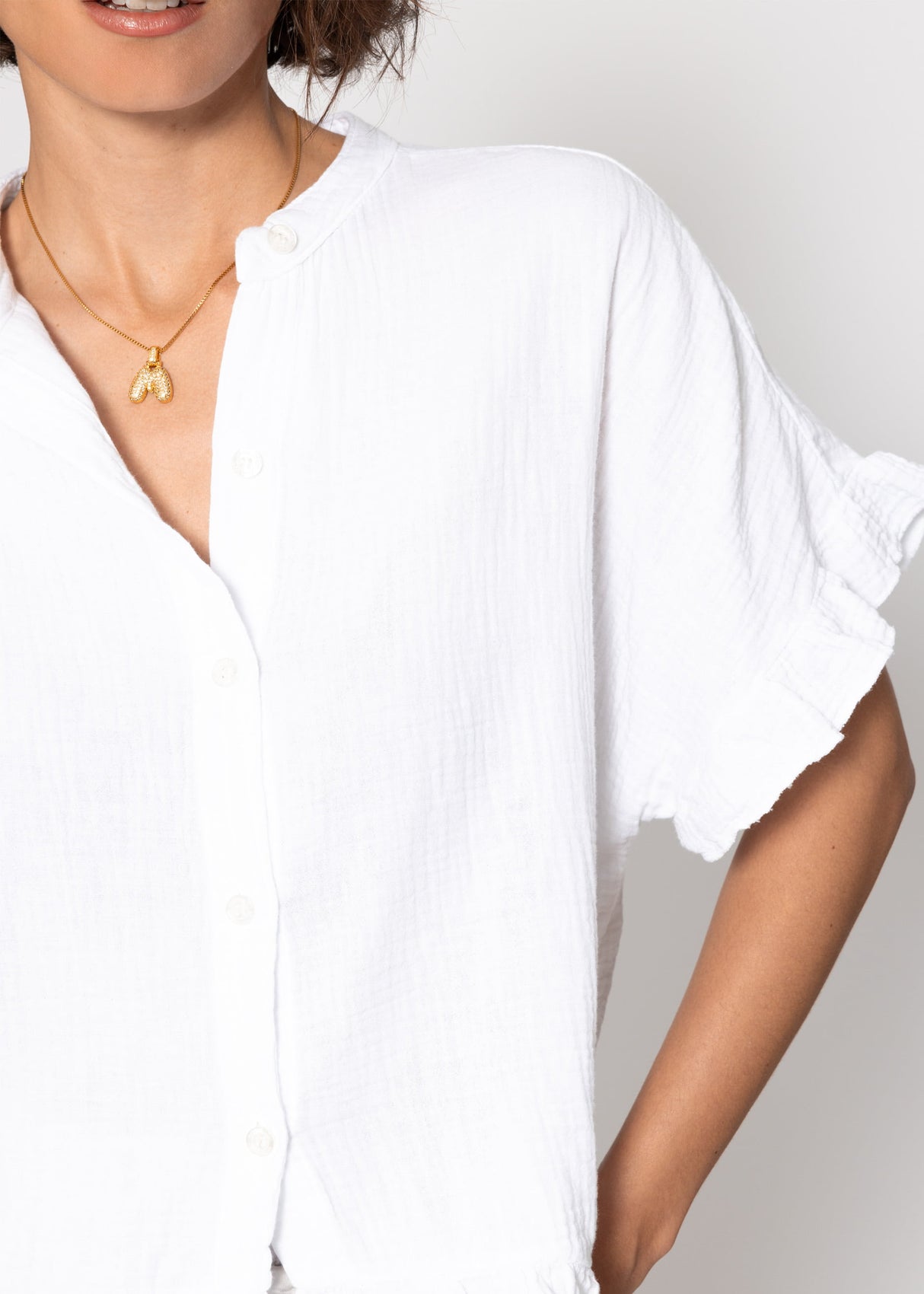 Musselin Bluse mit Rüschensaum - weiß