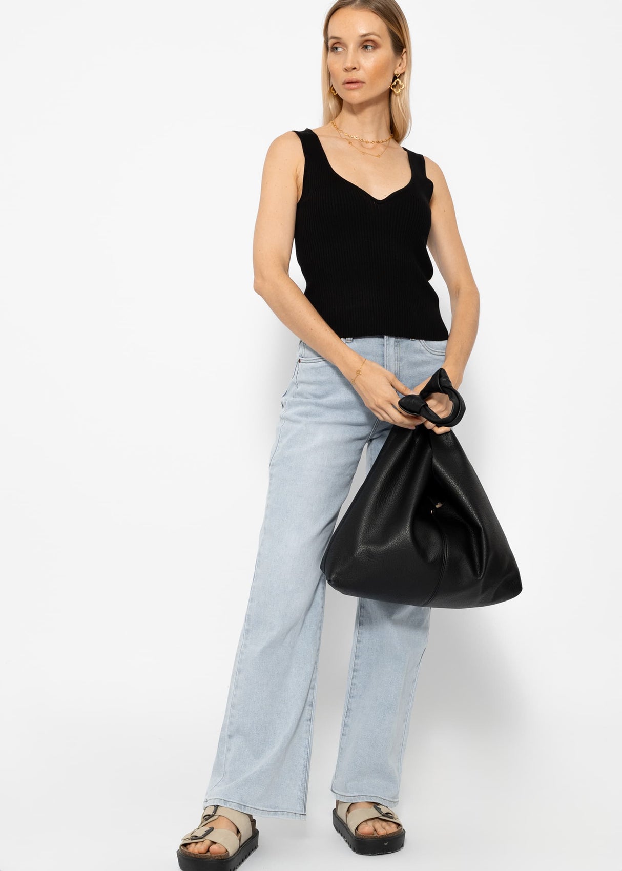 Knit top with heart-shaped neckline - black