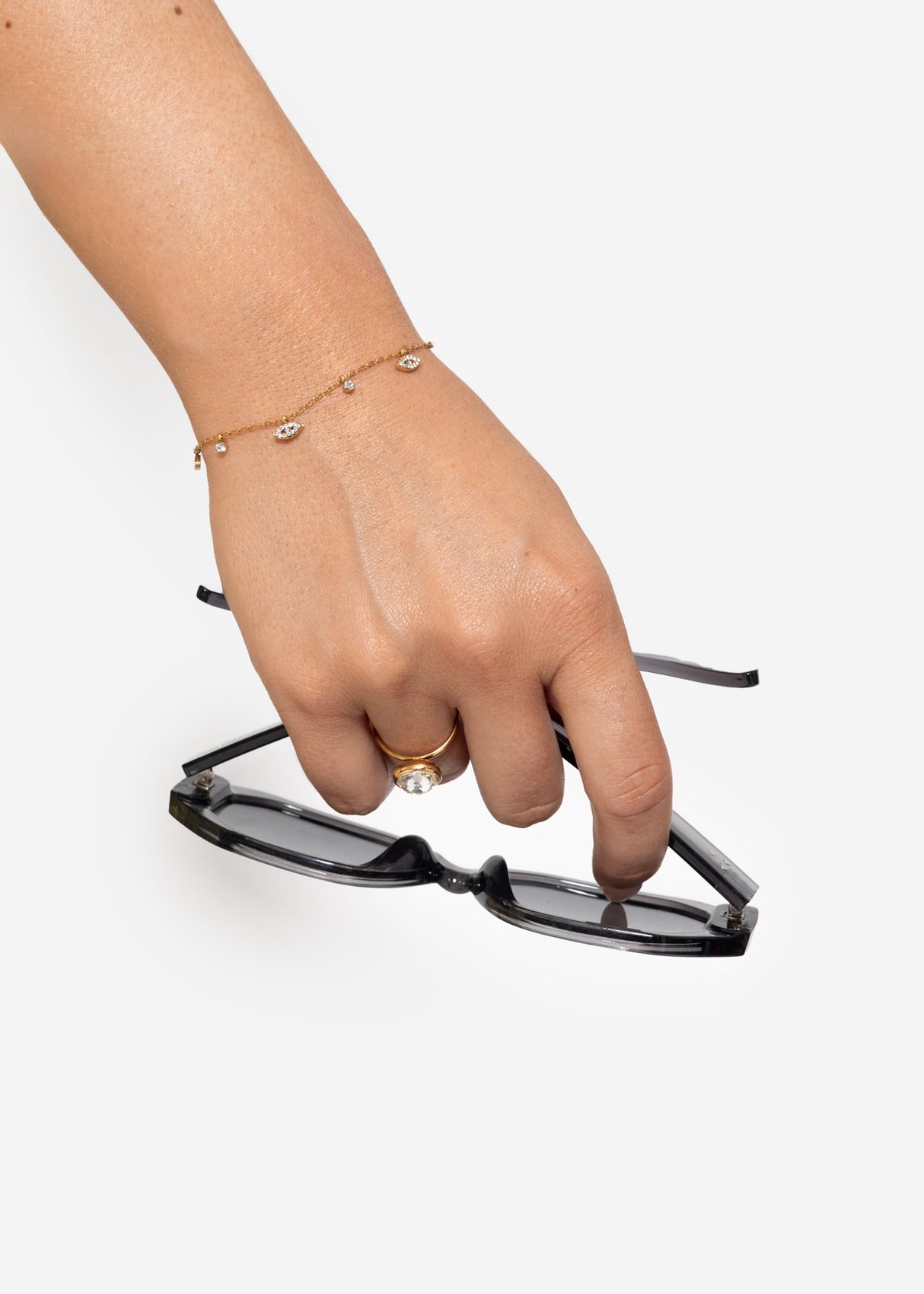 Bracelet with sparkling trailers - gold