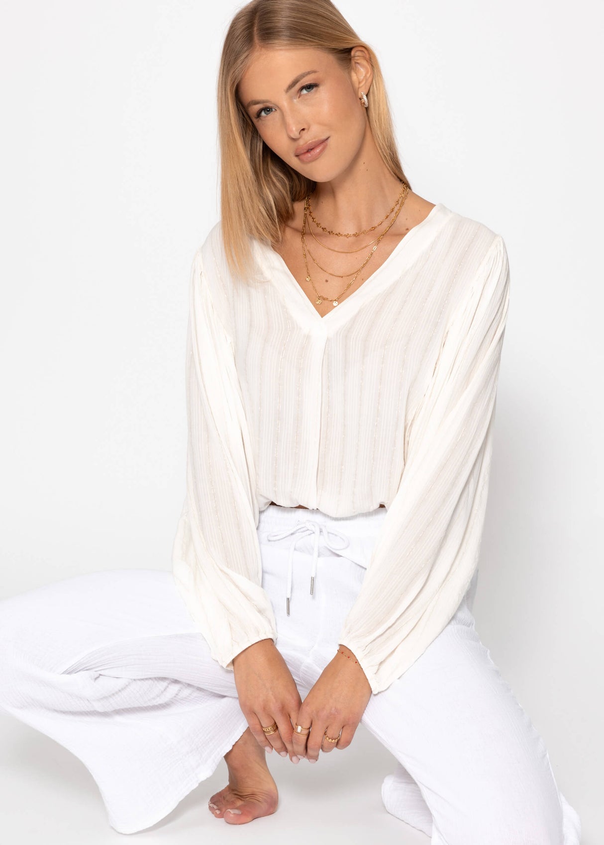 Bluse mit Glitzerstreifen - offwhite