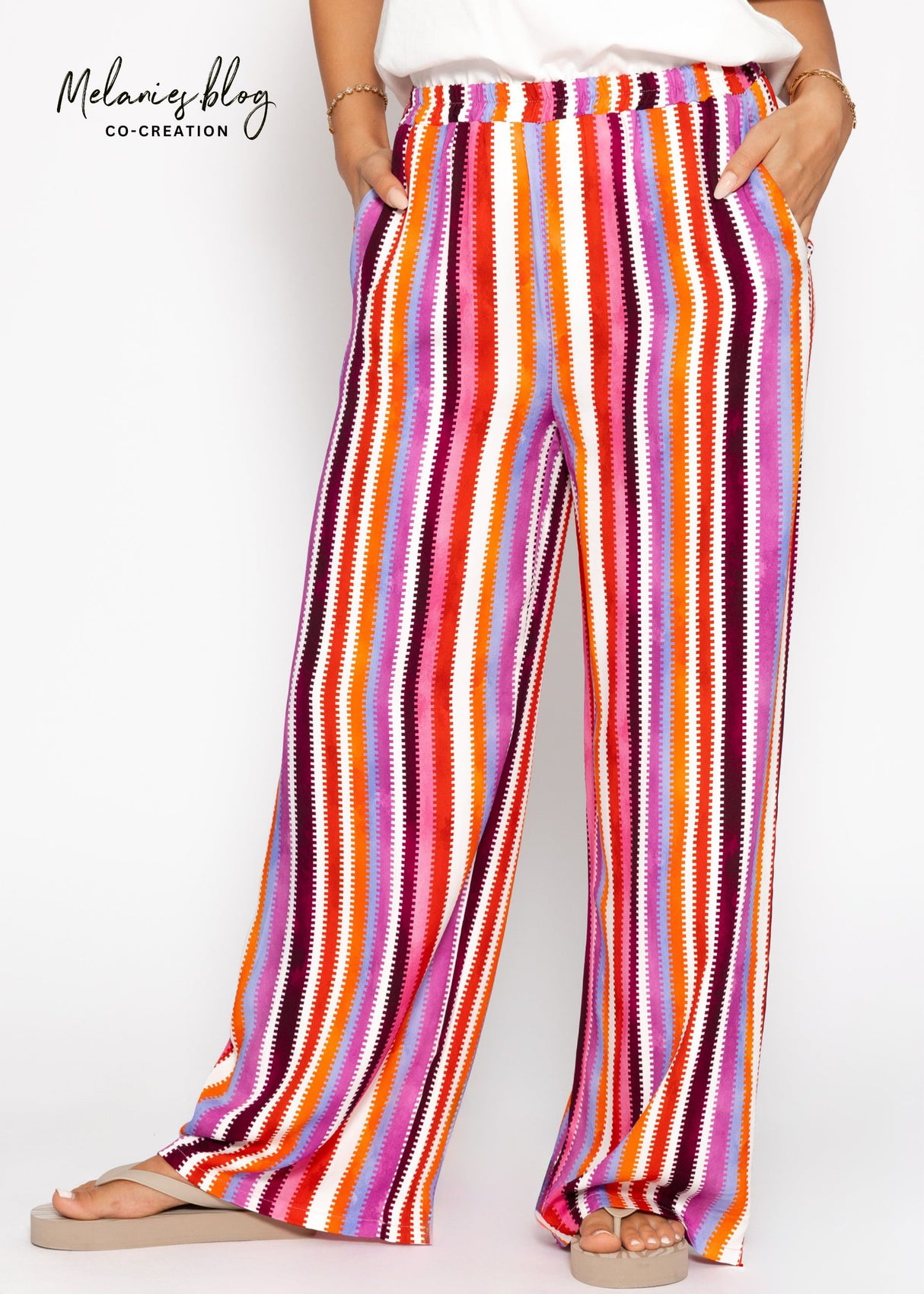 Gemusterte Hose mit weitem Bein - pink