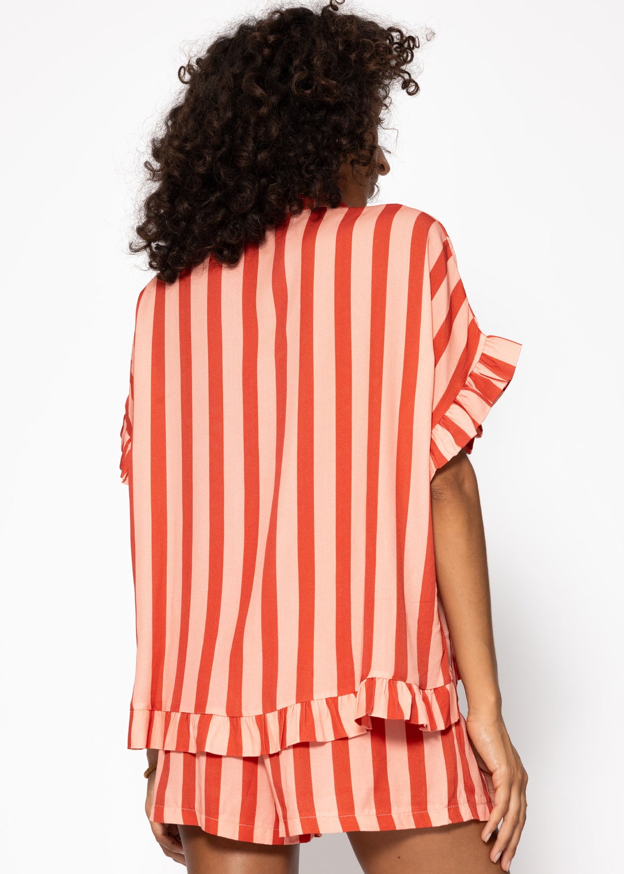 Striped blouse with ruffled hem - red