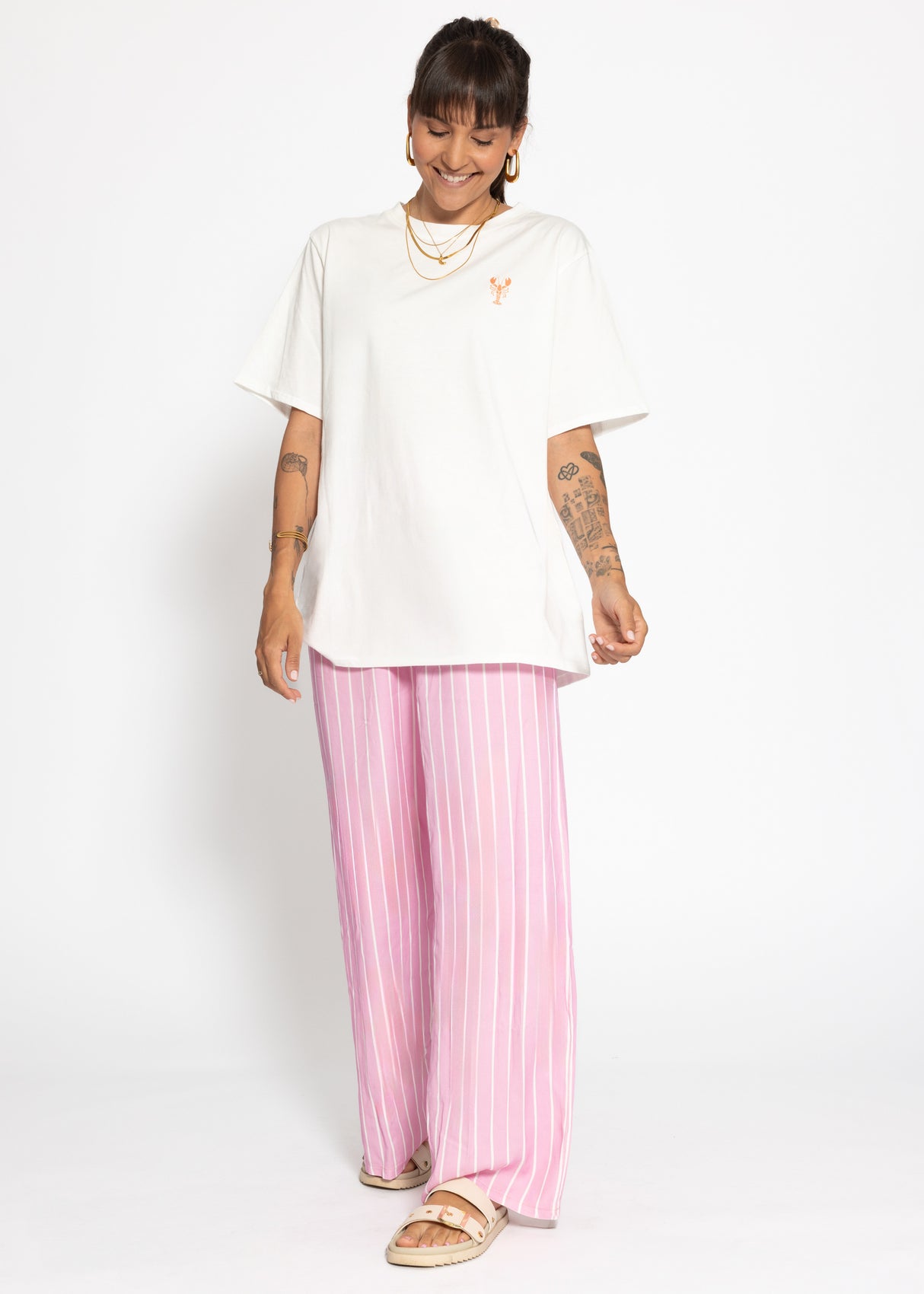 Gestreifte Hose mit weitem Bein - rosa