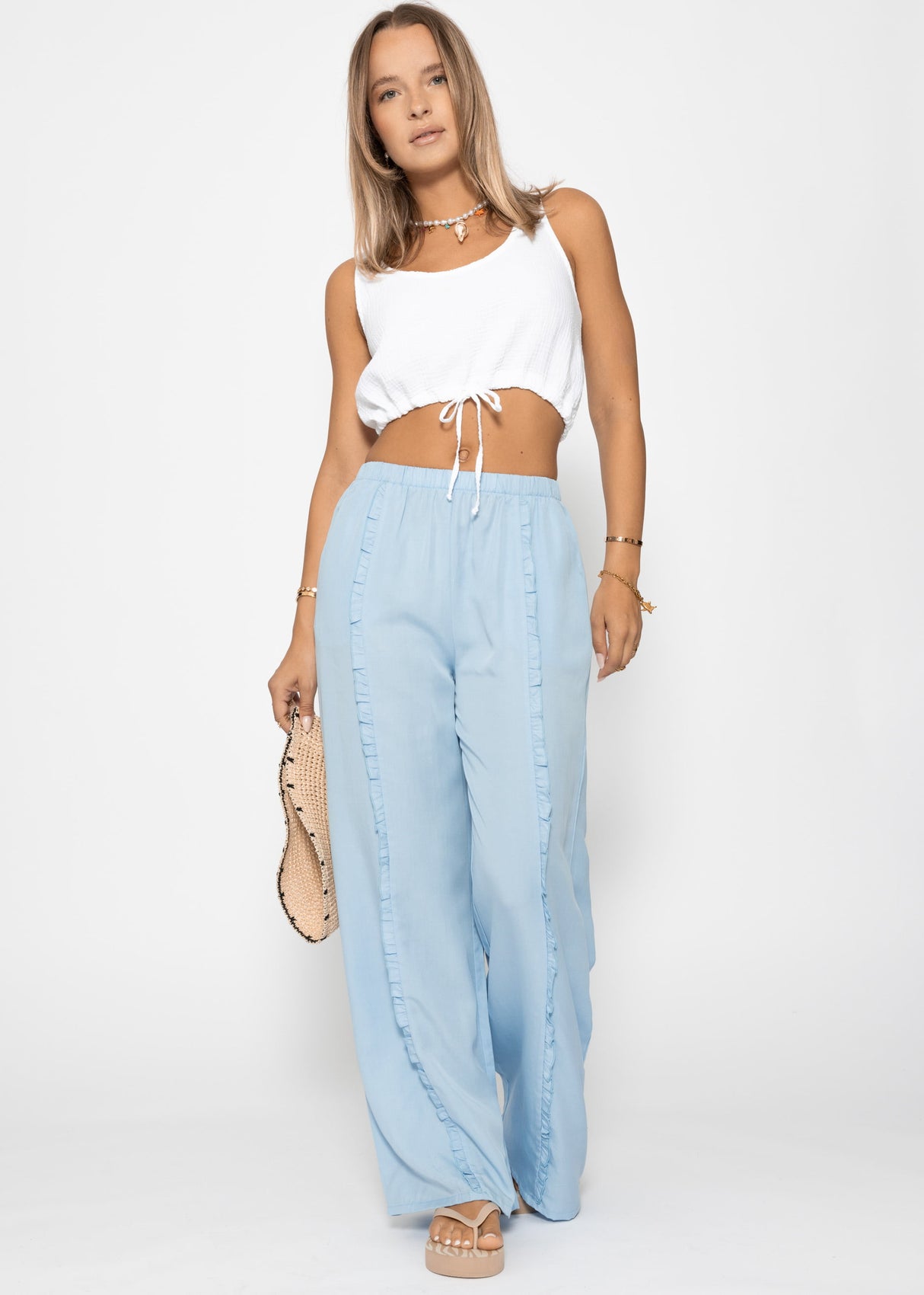 Hose mit weitem Bein und Rüschendetail - hellblau