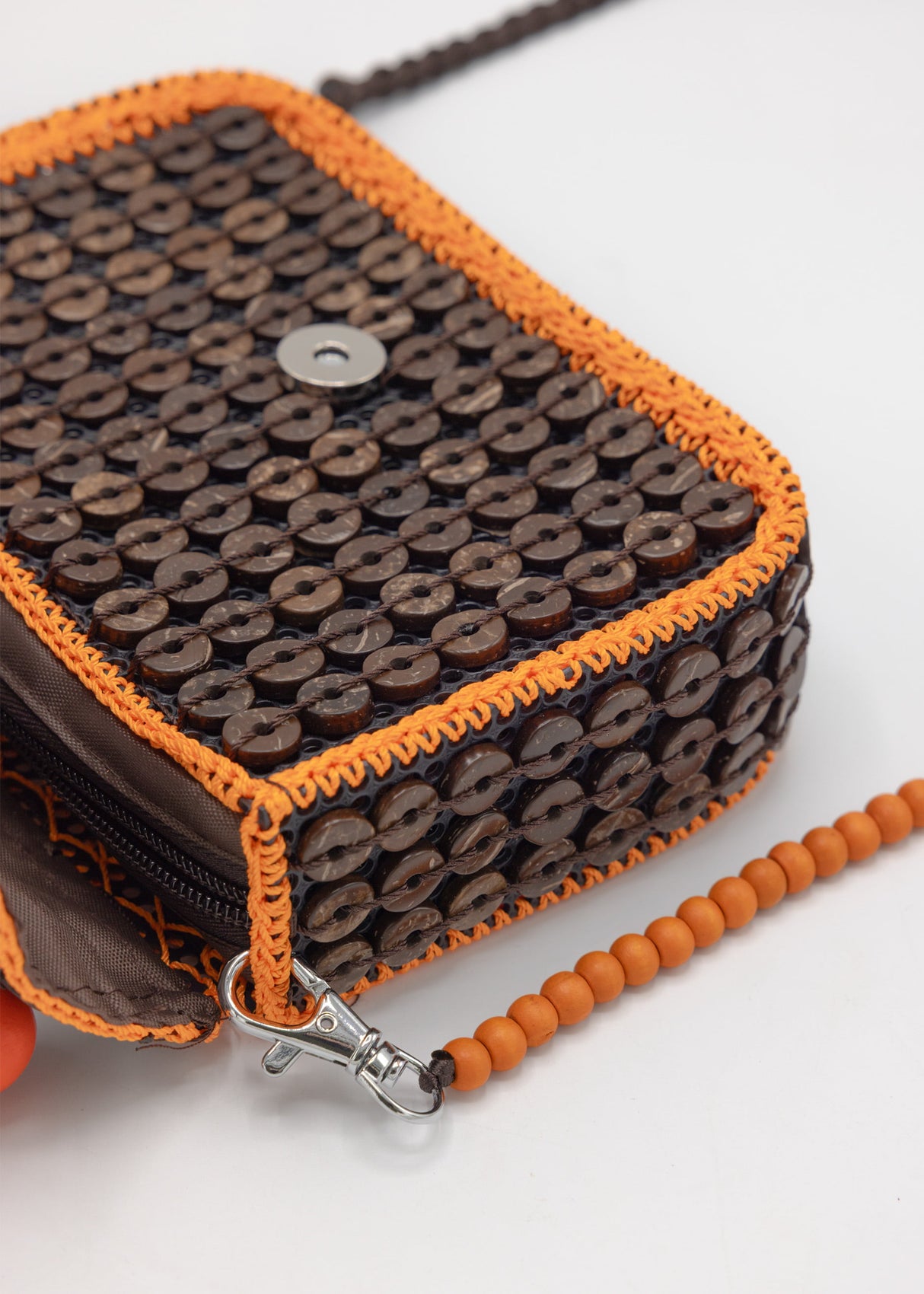Small bag with orange beaded handle - dark brown