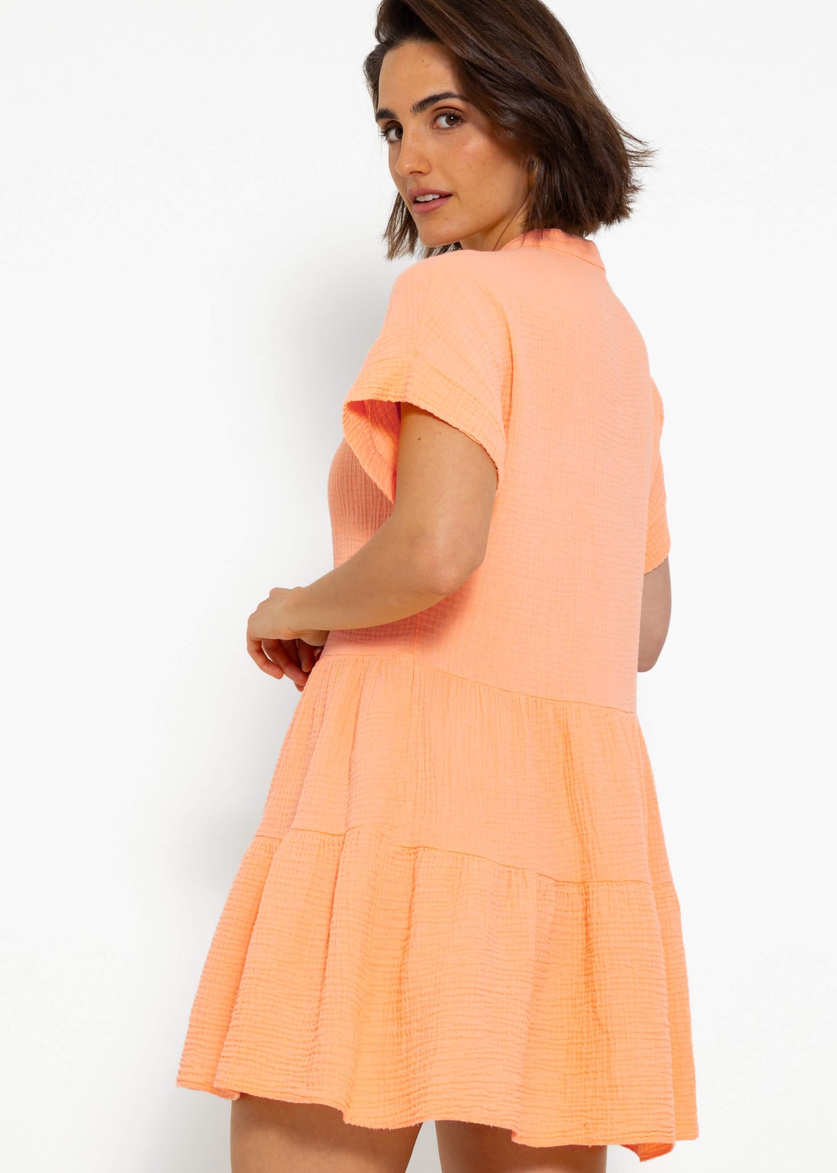 Short muslin dress with flounces - peach