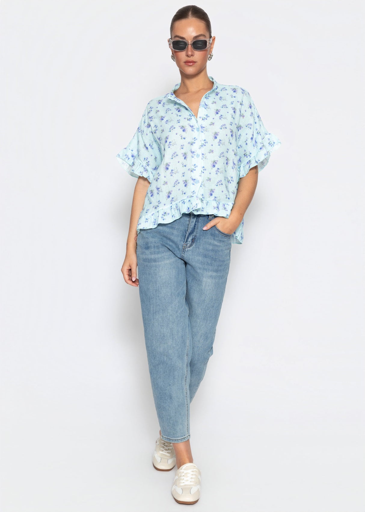 Musselin Bluse mit Rüschensaum und Blumenprint - blau