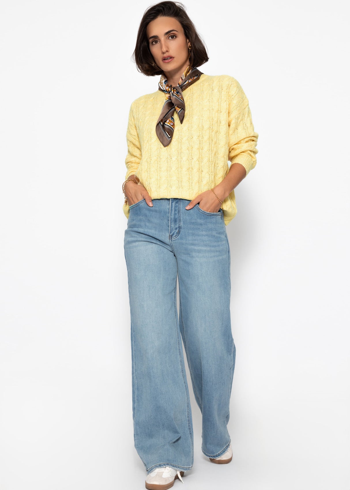 Sweater with a cable pattern - yellow