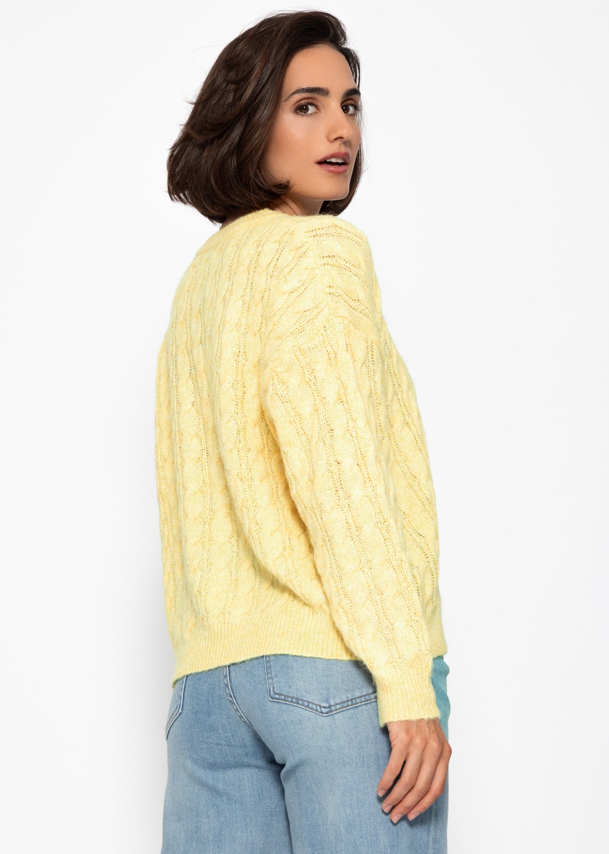 Sweater with a cable pattern - yellow