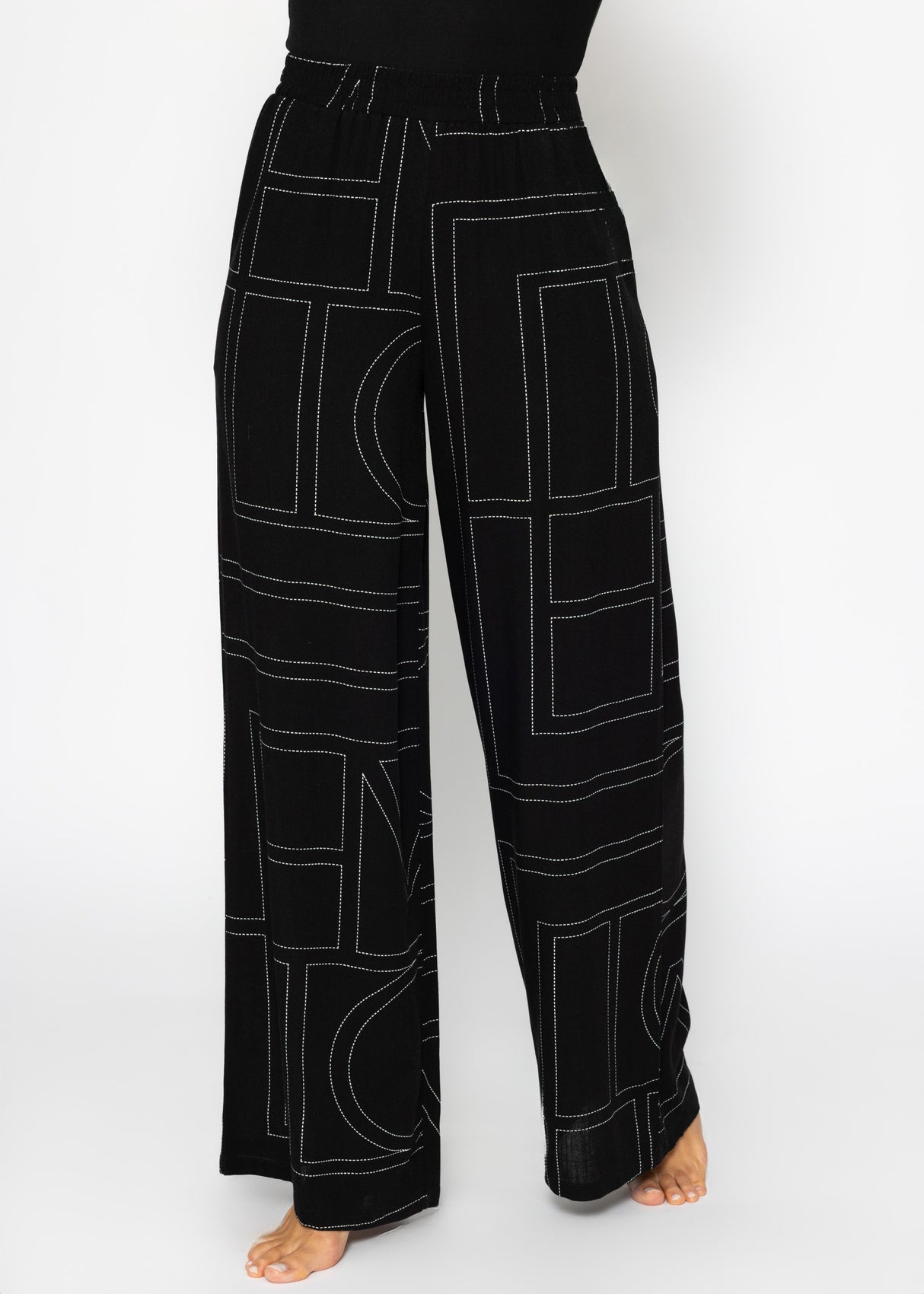 Schlupfhose mit Print - schwarz