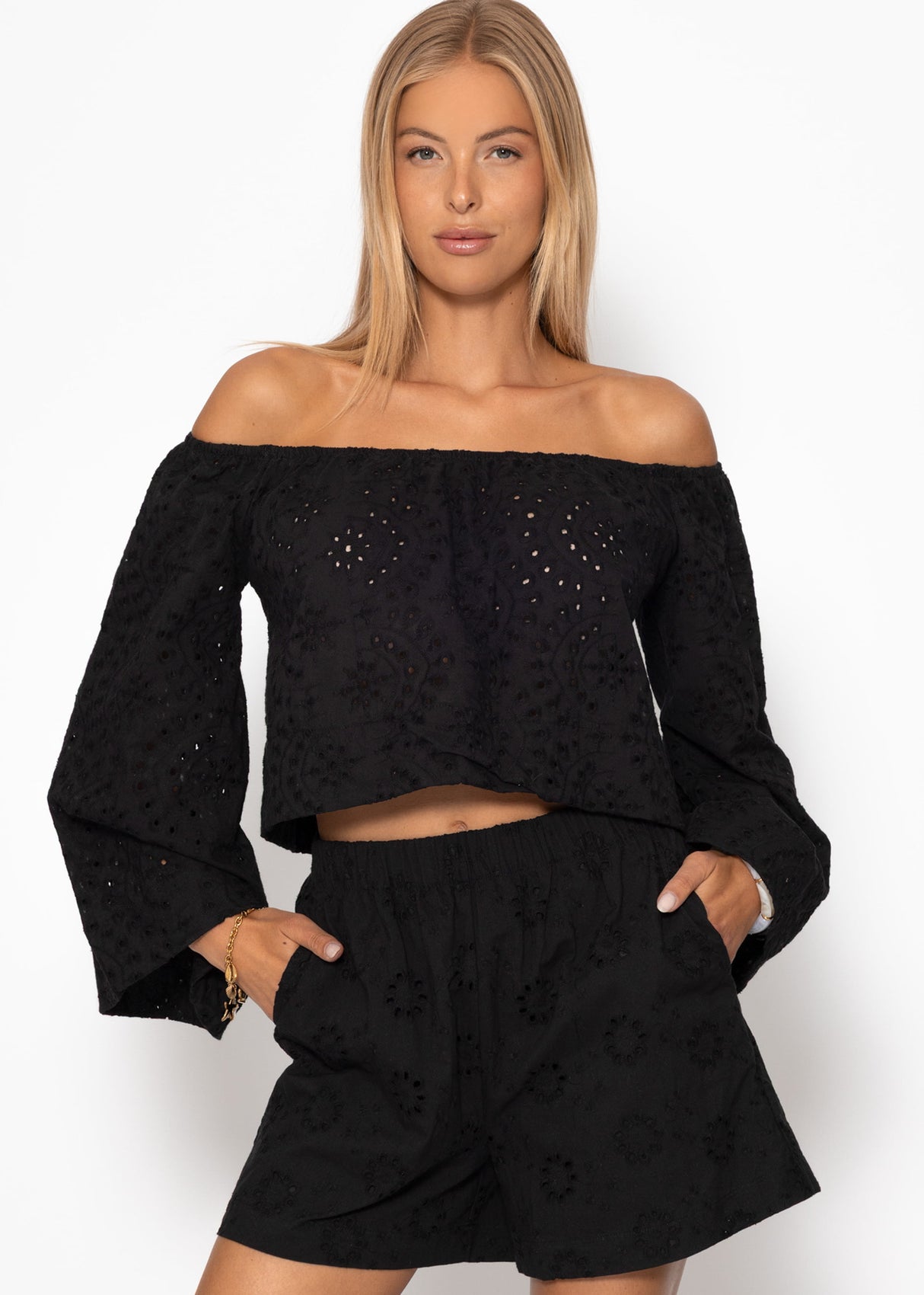 Off-the-shoulder long sleeve top with eyelet embroidery - black