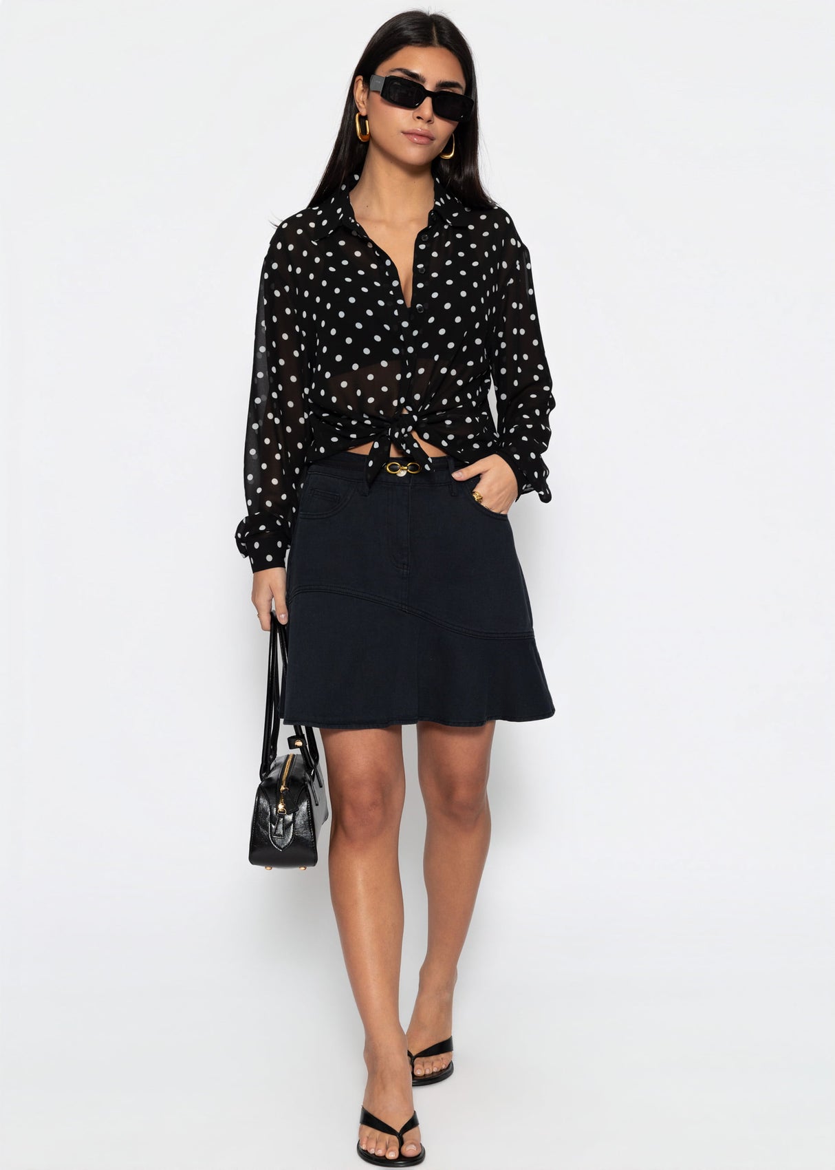 Transparente Bluse mit Pünktchenprint - schwarz