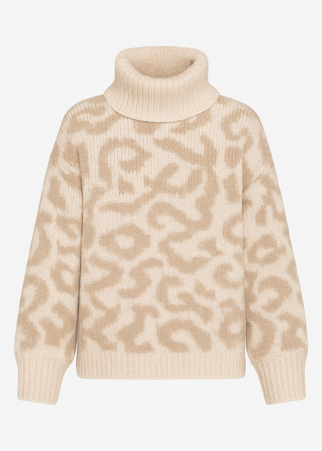 Rollkragenpullover mit Leomuster - beige