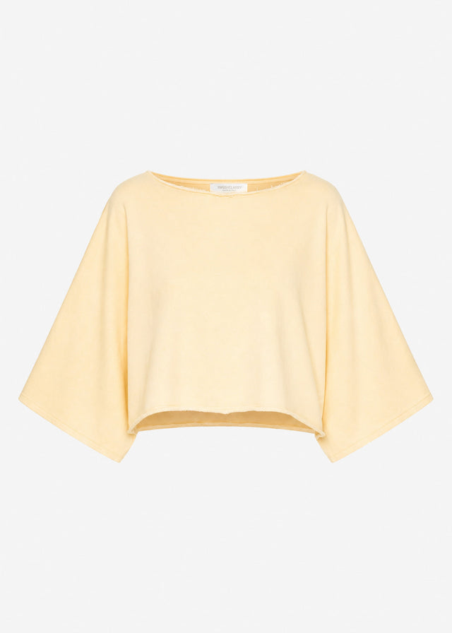 Kurzes Sweatshirt mit Fledermausärmel - buttergelb