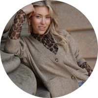 Women's beige cardigan with buttons and pockets, styled with a leopard-print blouse – a cozy knit cardigan in the SASSYCLASSY style