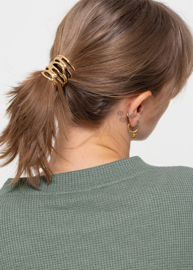 Haargummi mit Wellen Design - gold