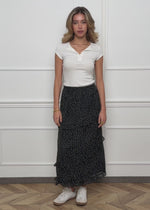 Polka dot long skirt with ruffles - black