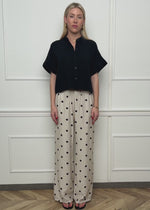 Gepunktete Hose mit weitem Bein - hellbeige