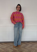 Oversized knit sweater with diamond pattern - pink-orange