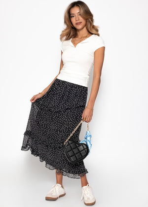 Polka dot long skirt with ruffles - black