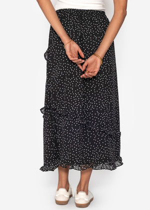 Polka dot long skirt with ruffles - black