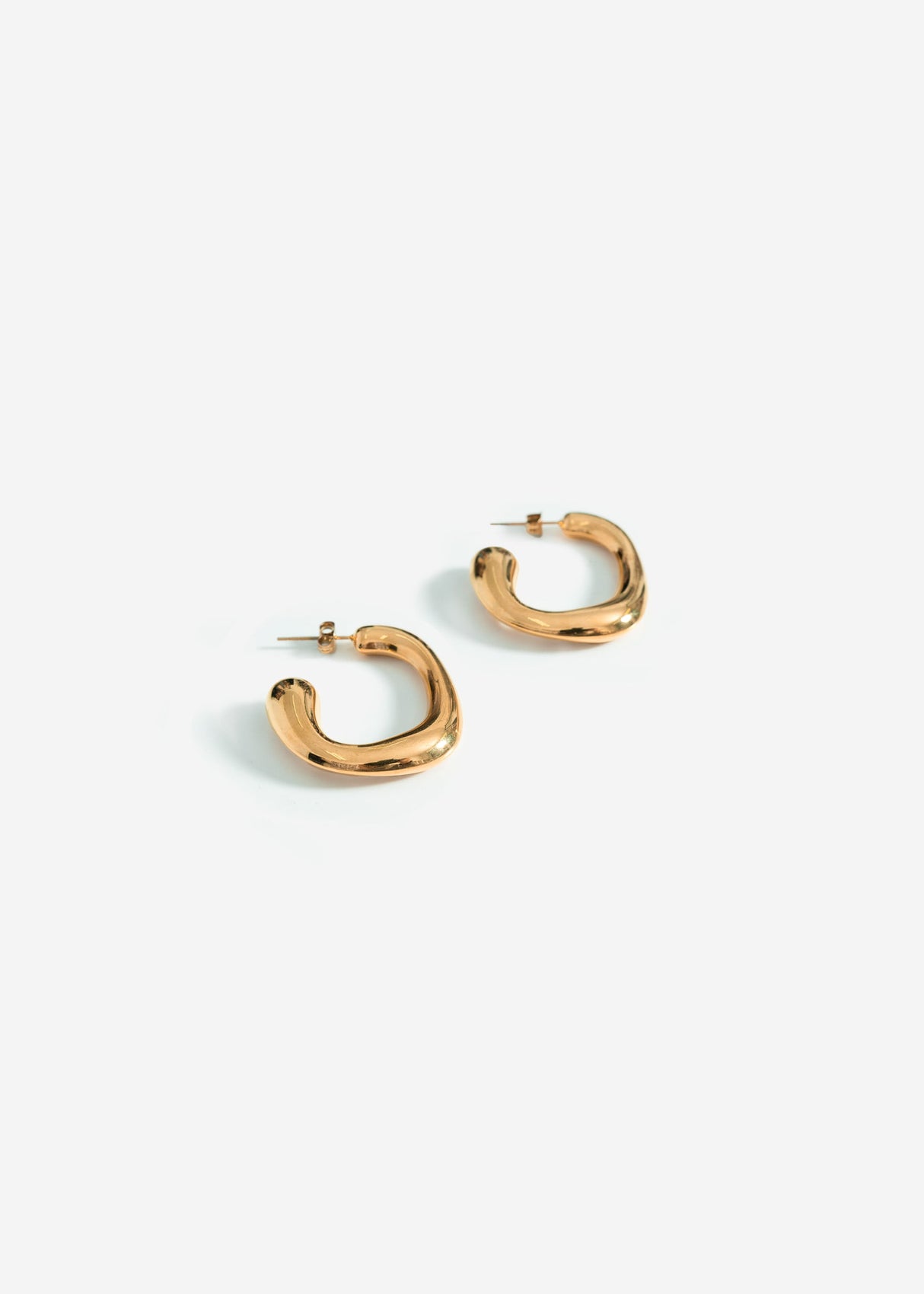 Curved organic hoop earrings - gold