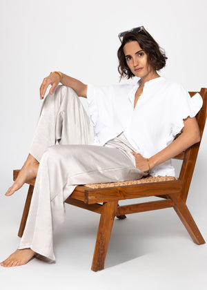 Musselin blouse with ruffled hem - white