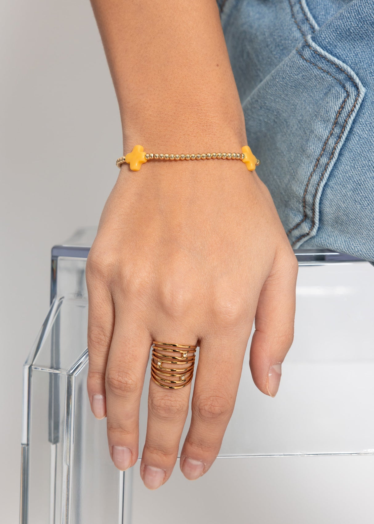 Armband mit gelben Schmucksteinen - gold