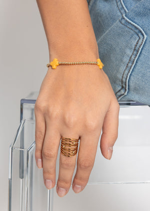 Armband mit gelben Schmucksteinen - gold