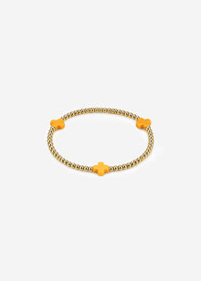 Armband mit gelben Schmucksteinen - gold