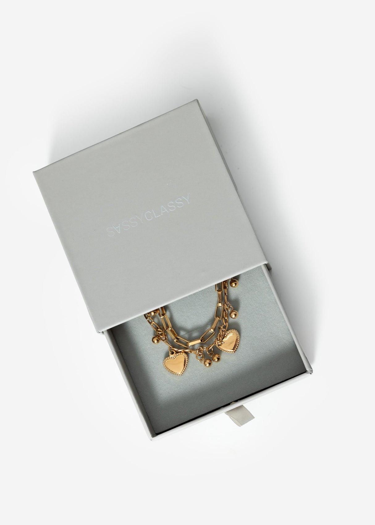 Armband mit Herzanhängern - gold