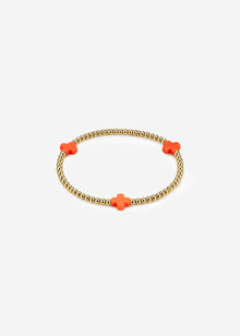 Armband mit roten Schmucksteinen - gold