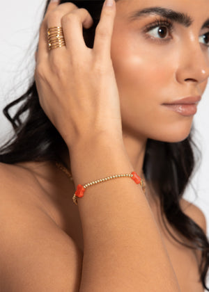 Bracelet with red gemstones - gold