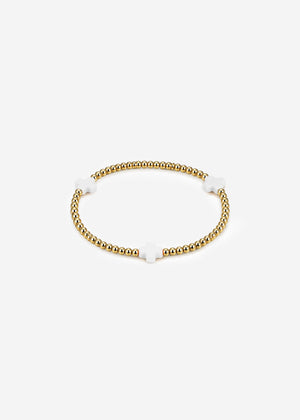 Armband mit weißen Schmucksteinen - gold
