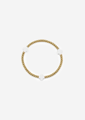 Armband mit weißen Schmucksteinen - gold
