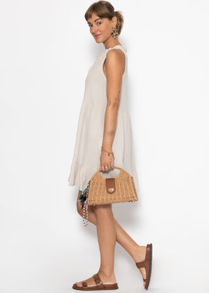 Ärmelloses Musselin Kleid mit Volants - beige