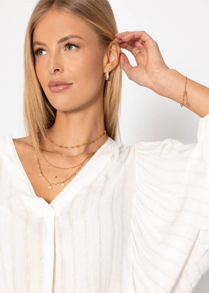 Bluse mit Glitzerstreifen - offwhite