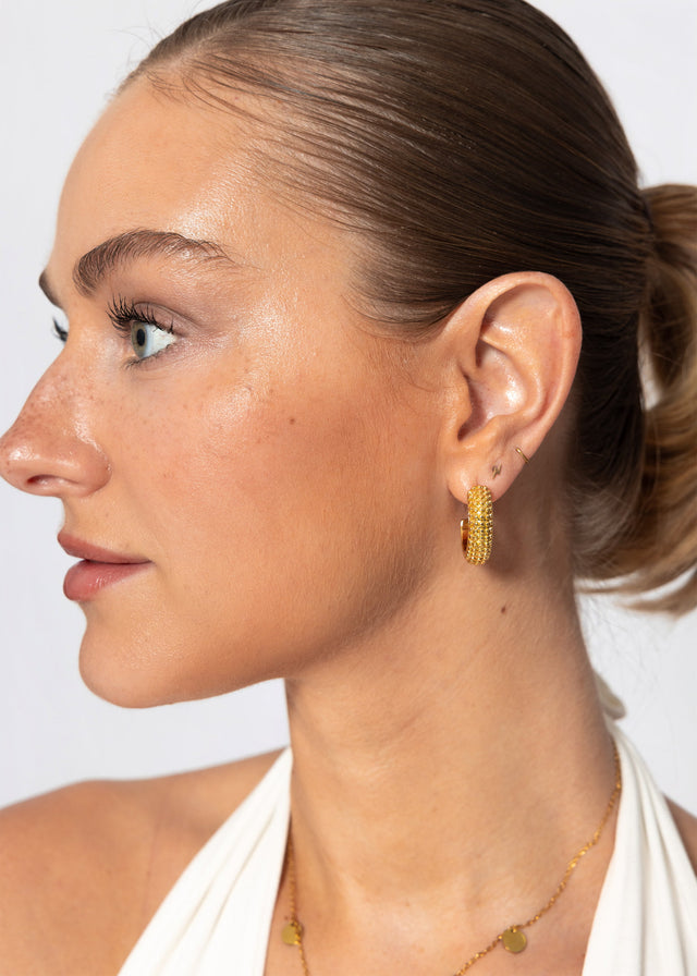 Textured hoop earrings - gold