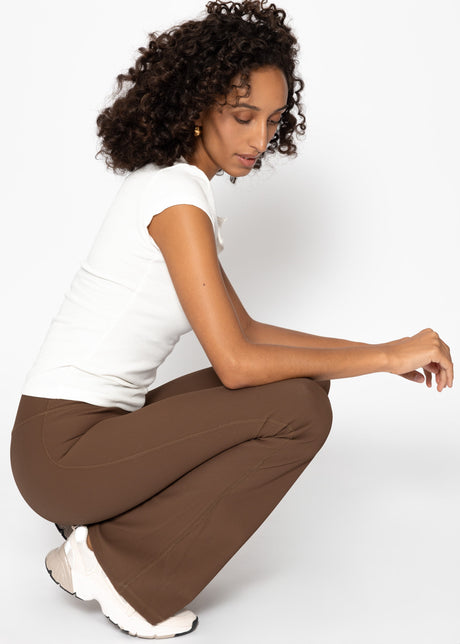 Flared leggings with ribbed texture - brown