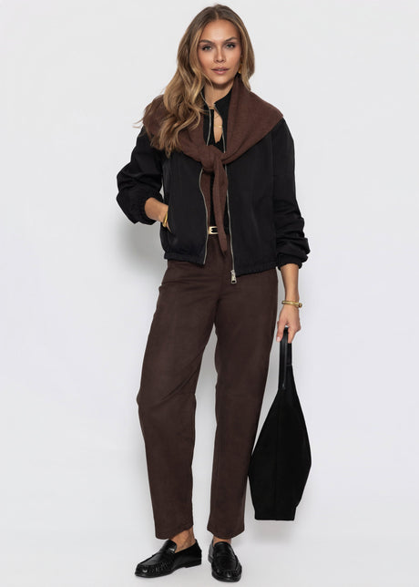 Geripptes Langarmshirt mit Knopfleiste - schwarz