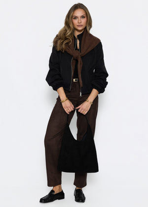 Ribbed long-sleeved top with button placket - black