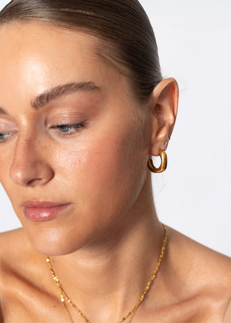 Curved hoop earrings - gold