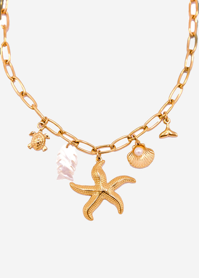 Necklace with maritime charms - gold