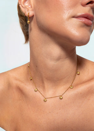 Halskette mit Muscheln - gold