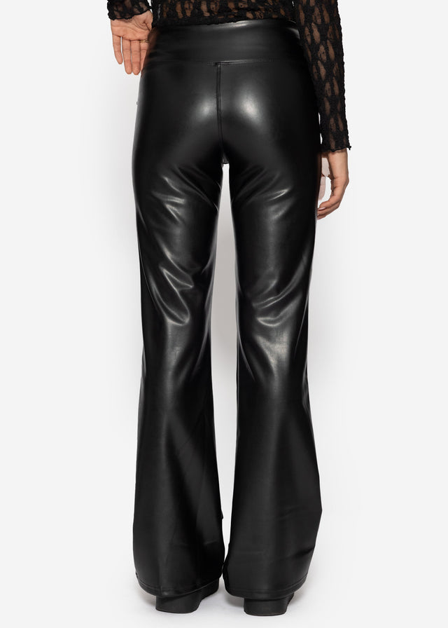 High-rise flared thermal faux leather leggings with wide waistband - black