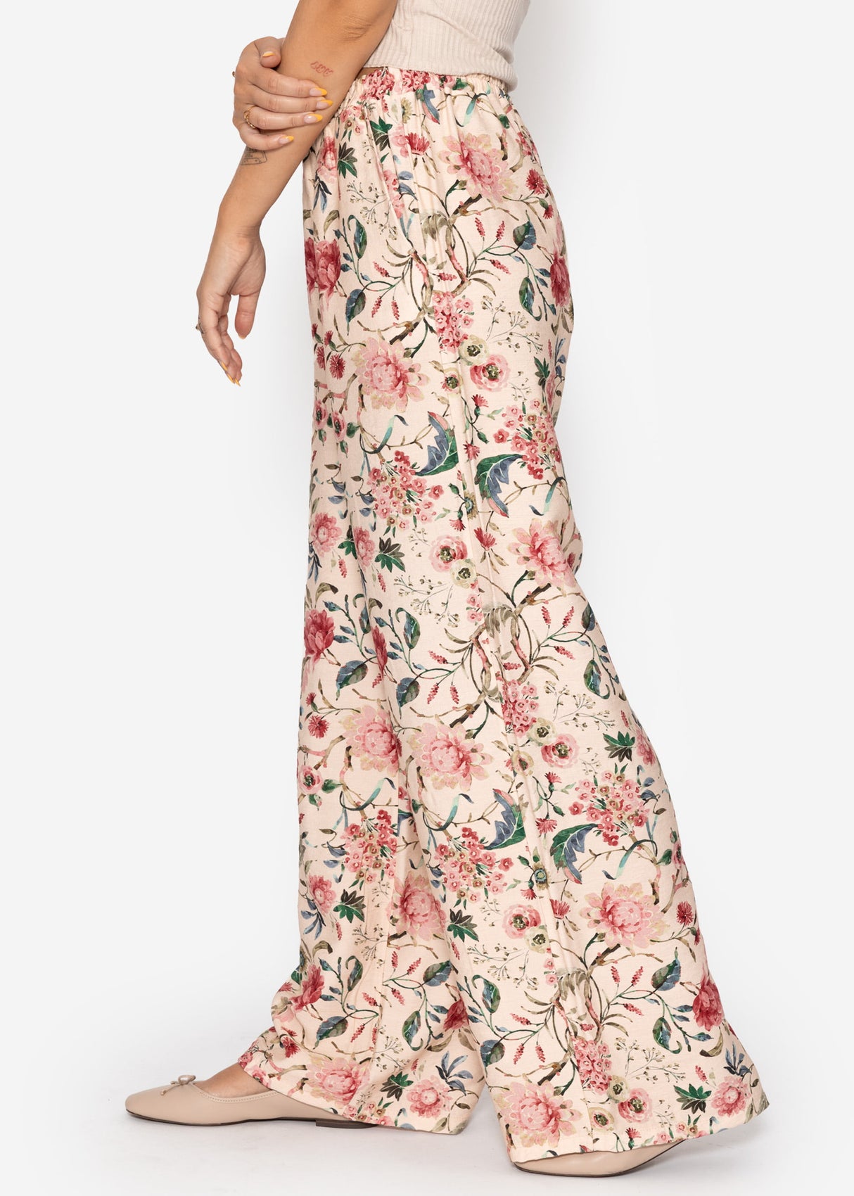 Hose mit Blümchendruck - beige