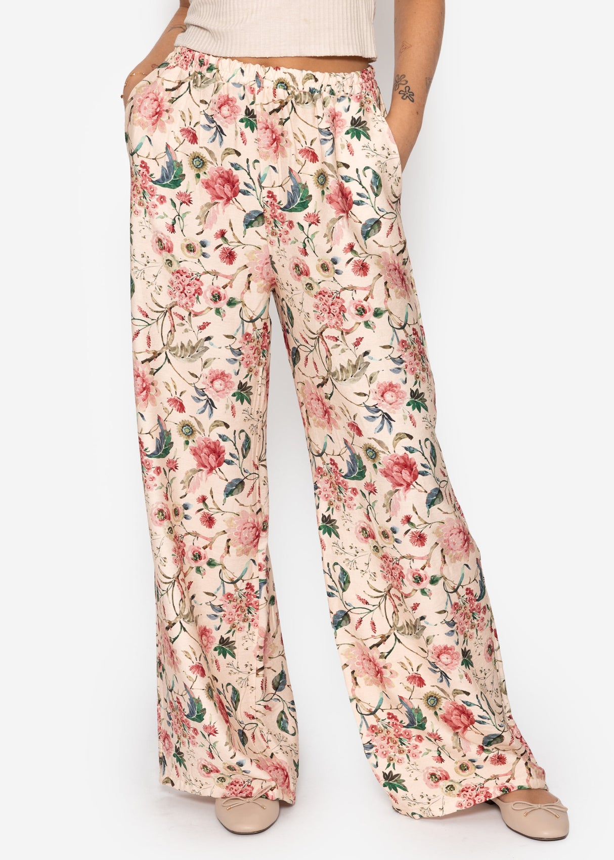Hose mit Blümchendruck - beige